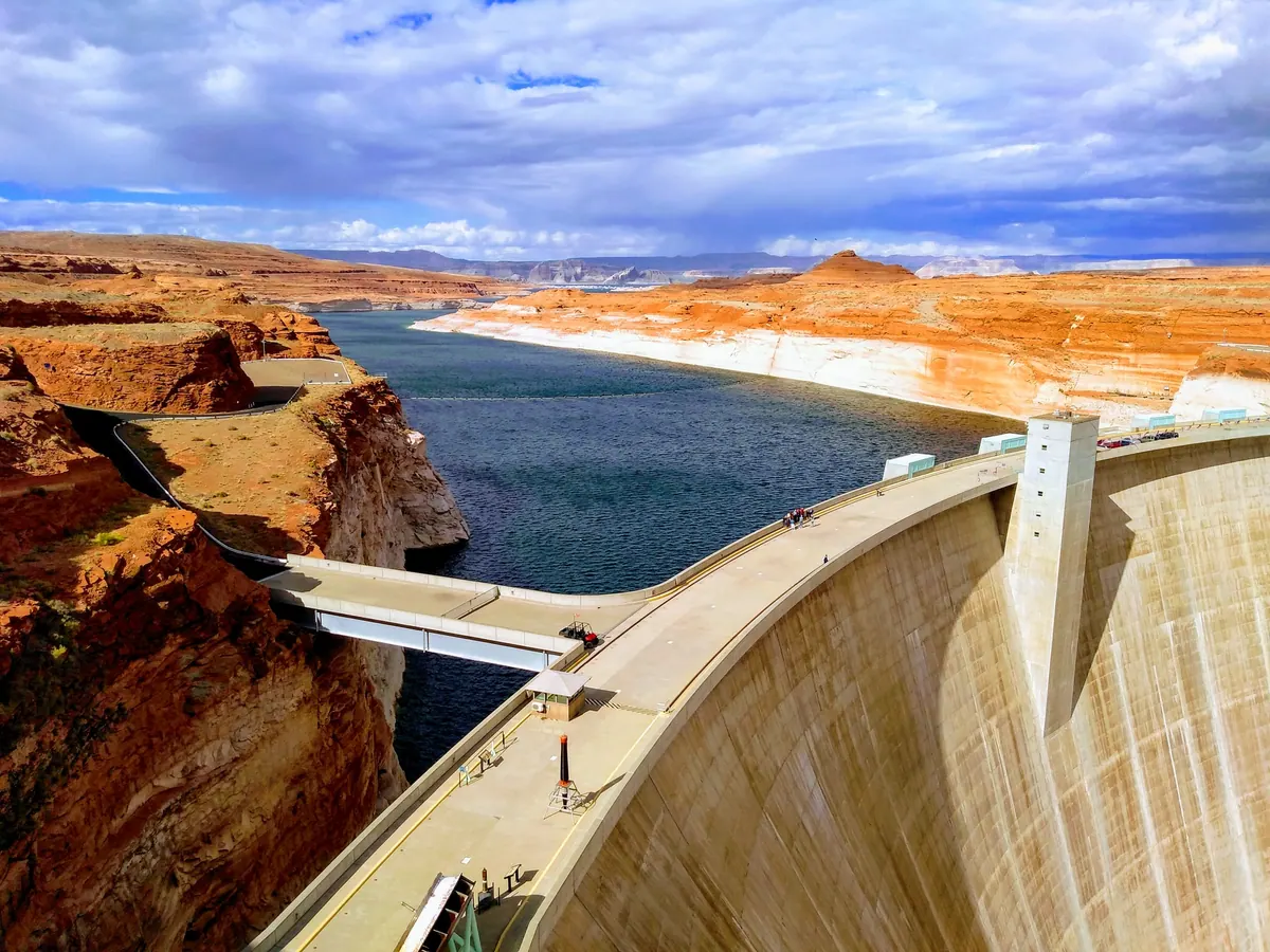 A hydroelectric dam holding back a river gorge — the scale of Africa's major projects
